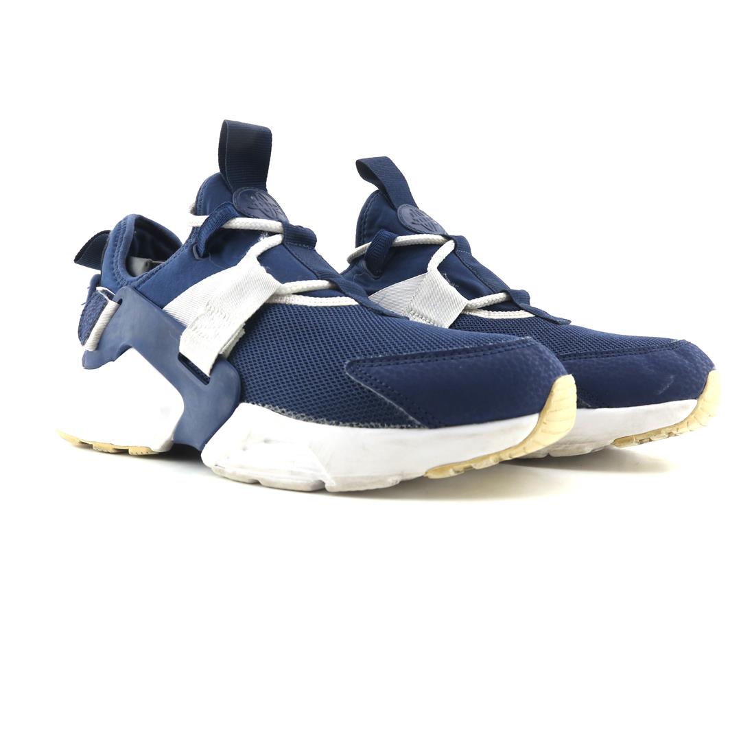 NIKE  AIR HUARACHE CITY LOW